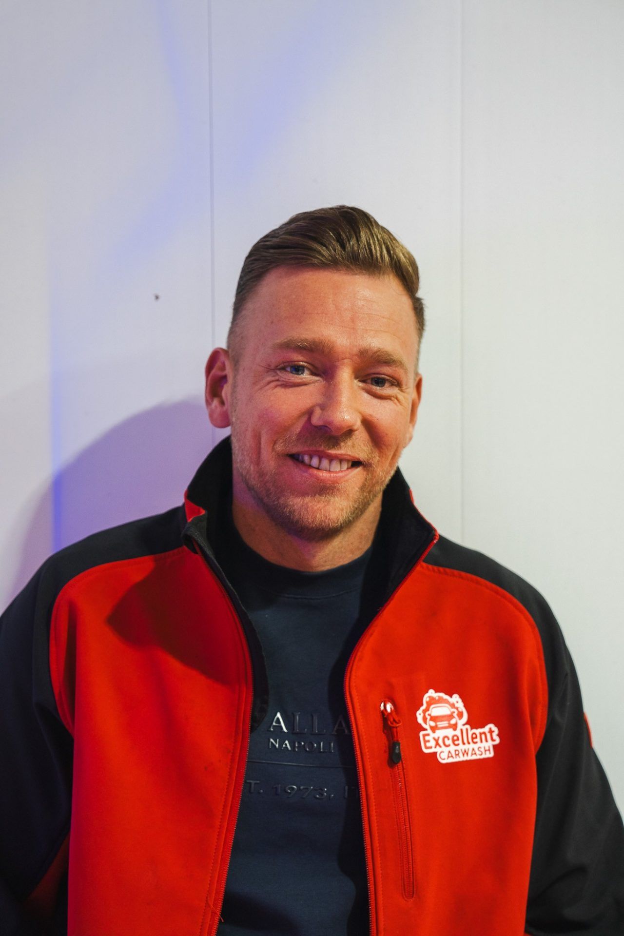 Maikel, captain of car care at Excellent Carwash Amsterdam.